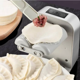 New electric dumpling making machine, with small brush for filling spoonQubat